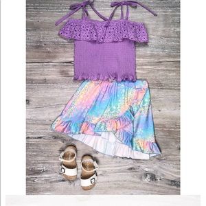 A rainbow wrap up skirt and shirt